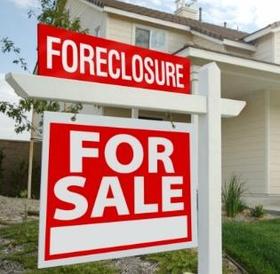 foreclosure-activity-down-realtytrac-market-report-distressed-homes-REO-filings
