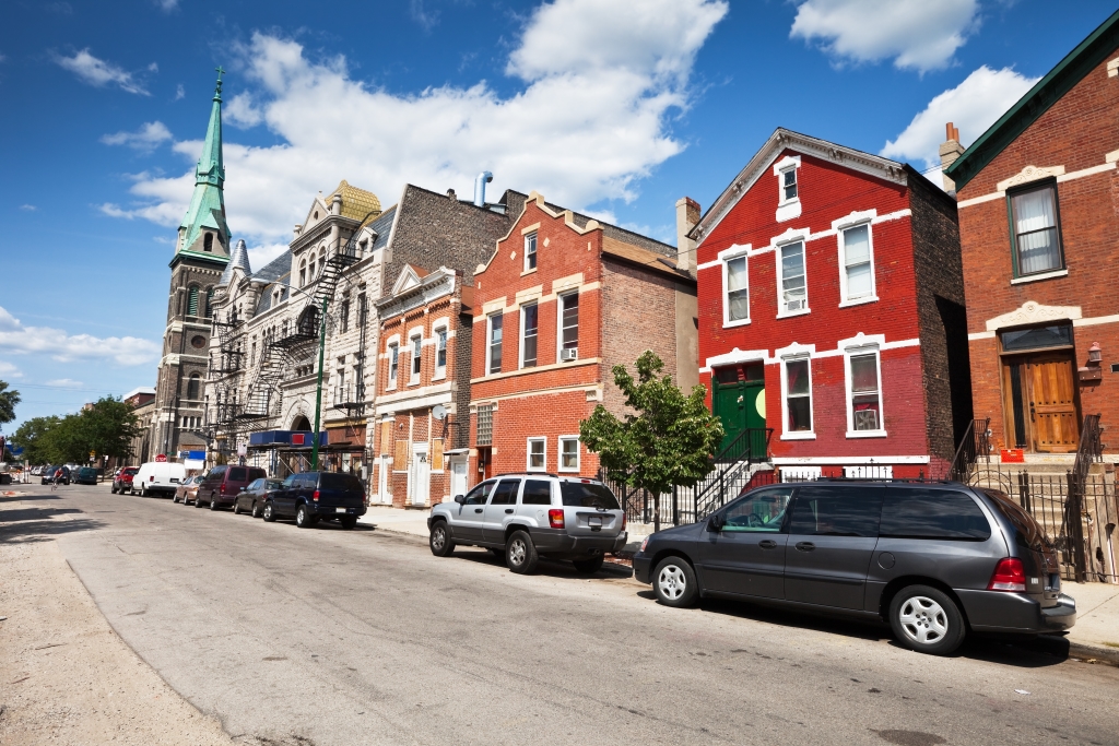 Street in Pilsen, a neighborhood of Chicago on the Lower West Side. Lat two buildings are Thalia Hall and Saint Procopius Church.